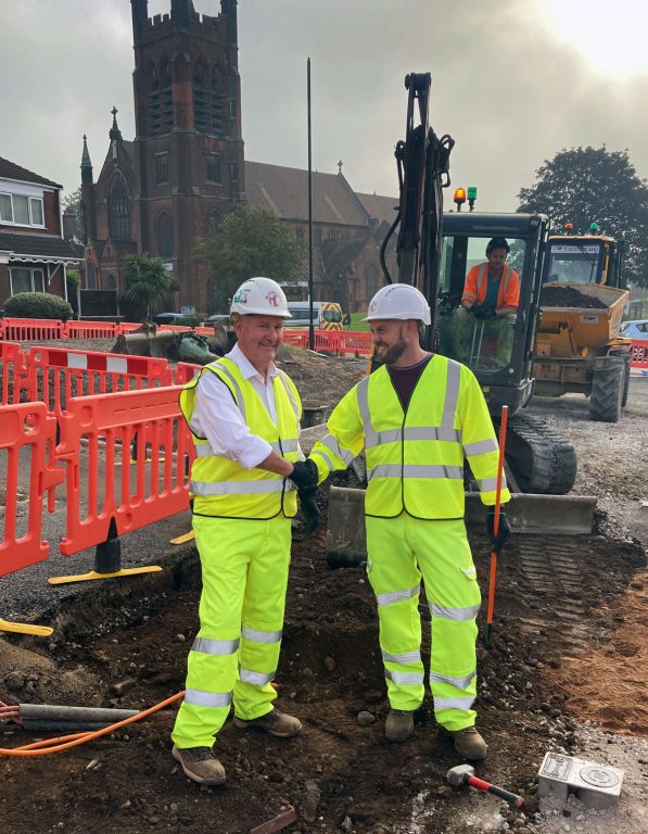 McPhillips Health & Safety Manager Stuart Bishop congratulates Site Manager Phill Bennet